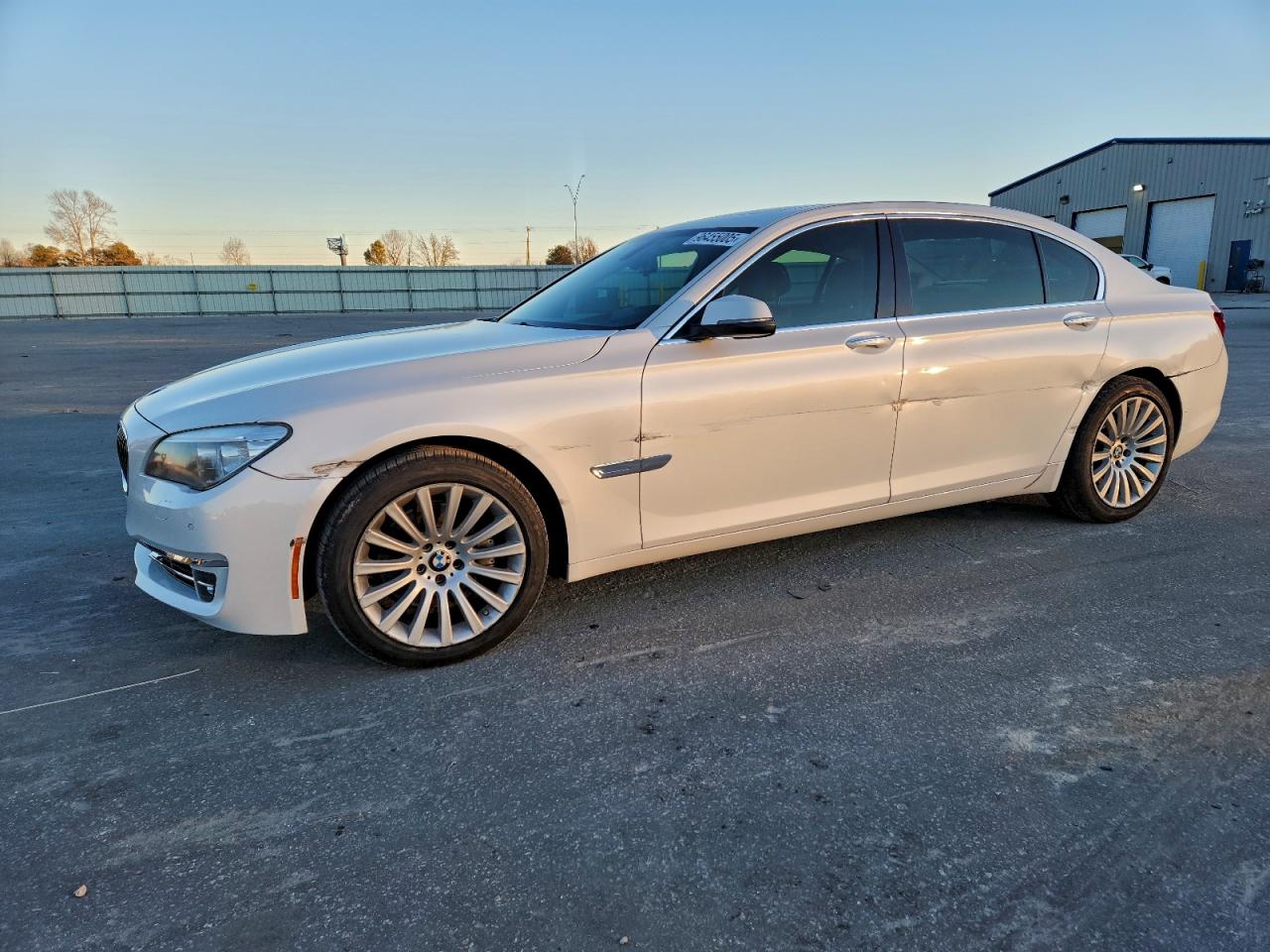 2013 BMW 7 Series 740Li xDrive, VIN WBAYF4C57DDE23687 — Side