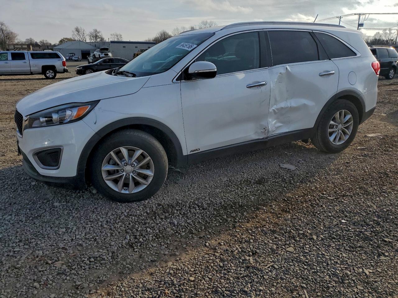 2016 Kia Sorento LX, VIN 5XYPGDA32GG108859 — Side