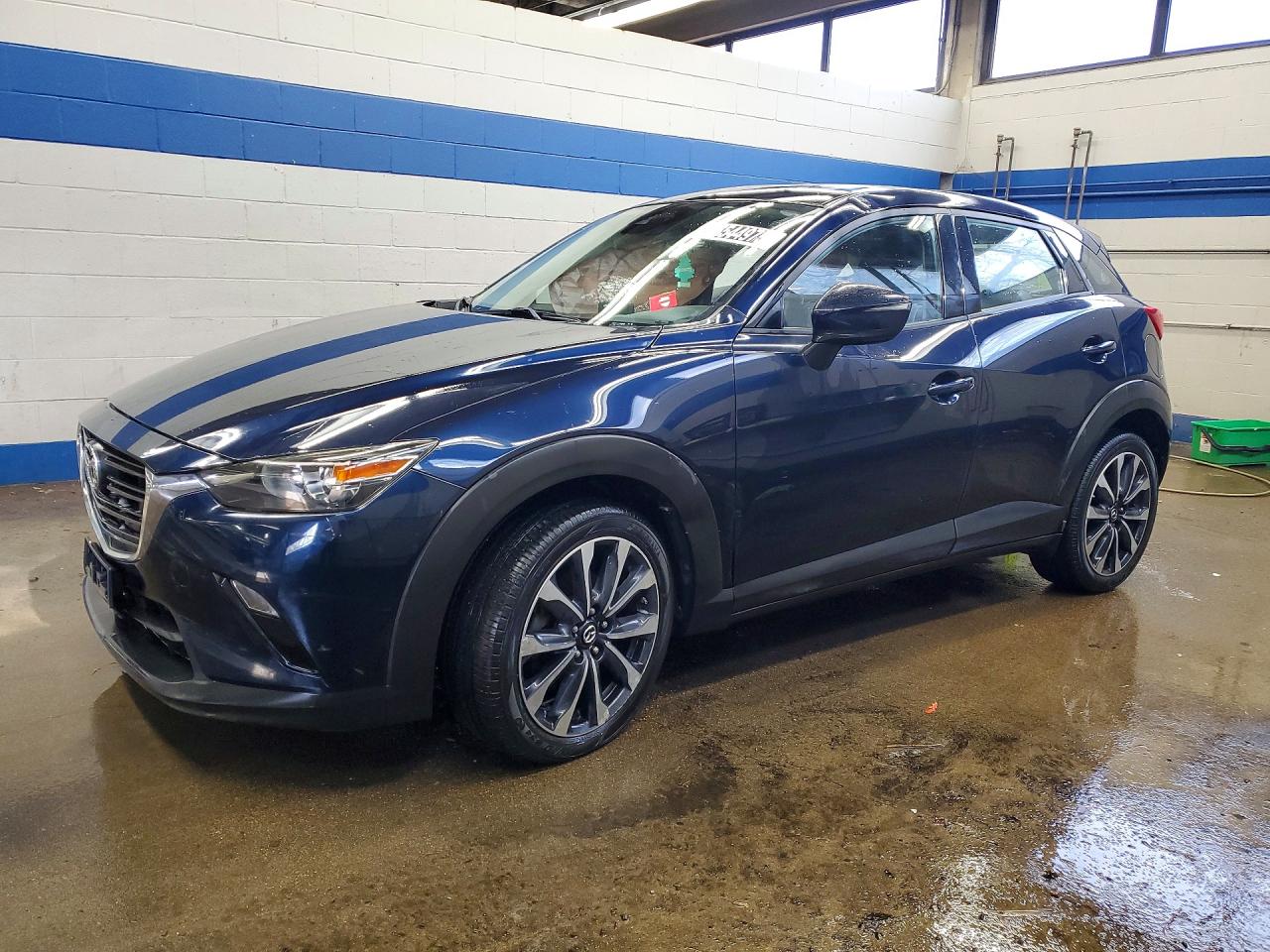 2019 Mazda CX-3 Touring, VIN JM1DKFC71K0408064 — Side