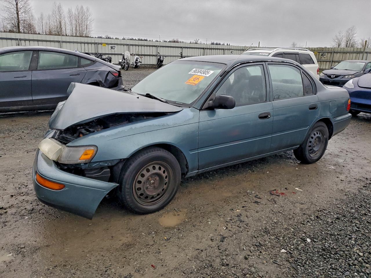 1995 Toyota Corolla, VIN 1NXAE04B2SZ234231 — Front end