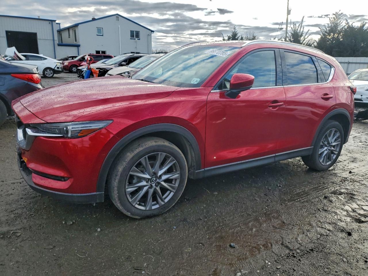 2021 Mazda CX-5 Grand Touring, VIN JM3KFBDM9M1335667 — Minor dents and scratches