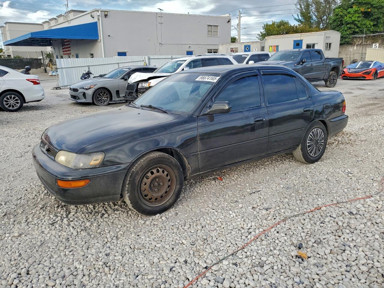 1995 Toyota Corolla DX, VIN 2T1AE09B9SC097850 — Front end