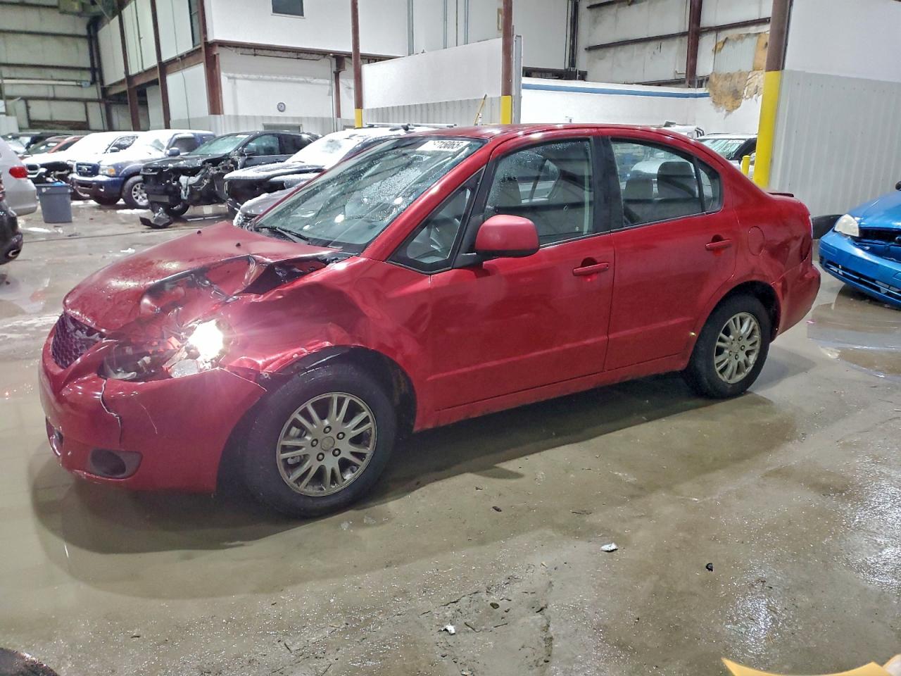 2012 Suzuki SX4 LE, VIN JS2YC5A32C6303952 — Front end