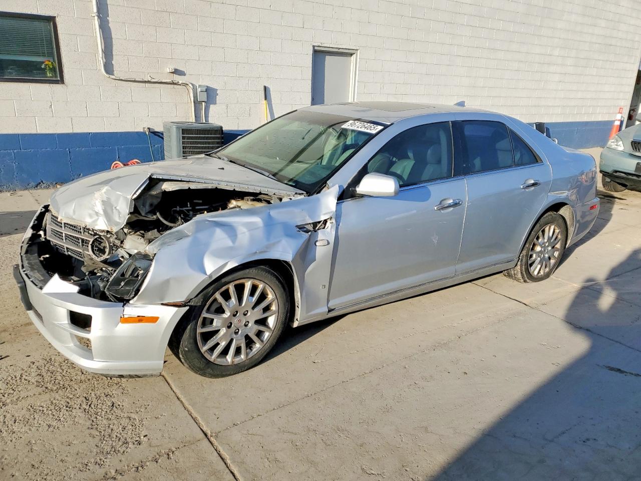 2009 Cadillac STS AWD, VIN 1G6DA67V690138063 — Перед