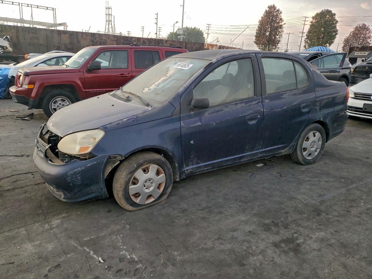 2003 Toyota ECHO, VIN JTDBT123X35052241 — Front end