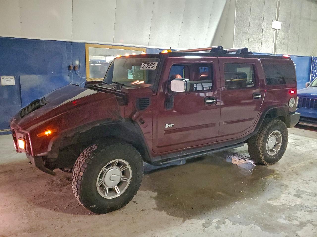2003 Hummer H2, VIN 5GRGN23U23H144695 — Front end