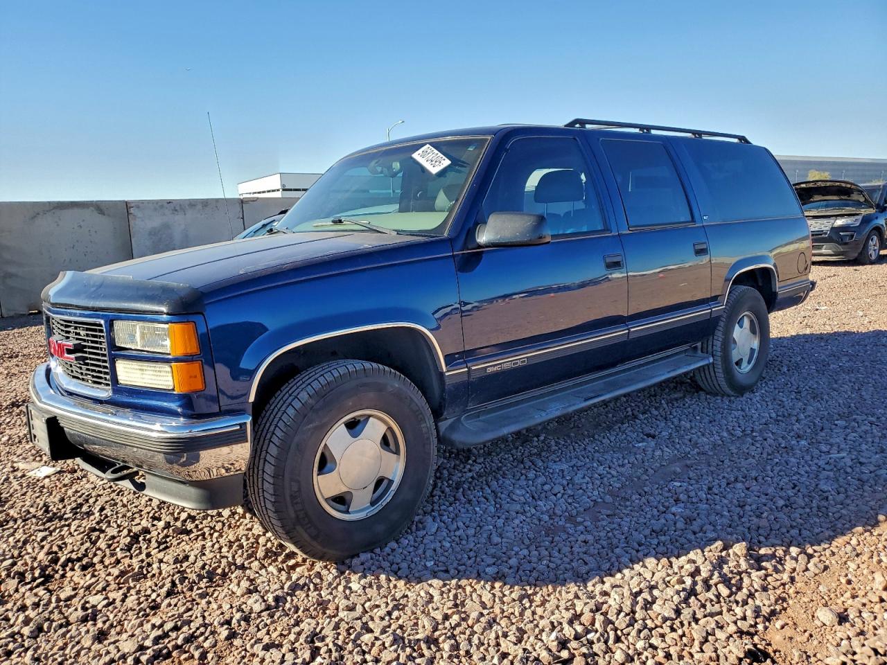 1997 GMC Suburban, VIN 3GKFK16R3VG523584 — Rear end