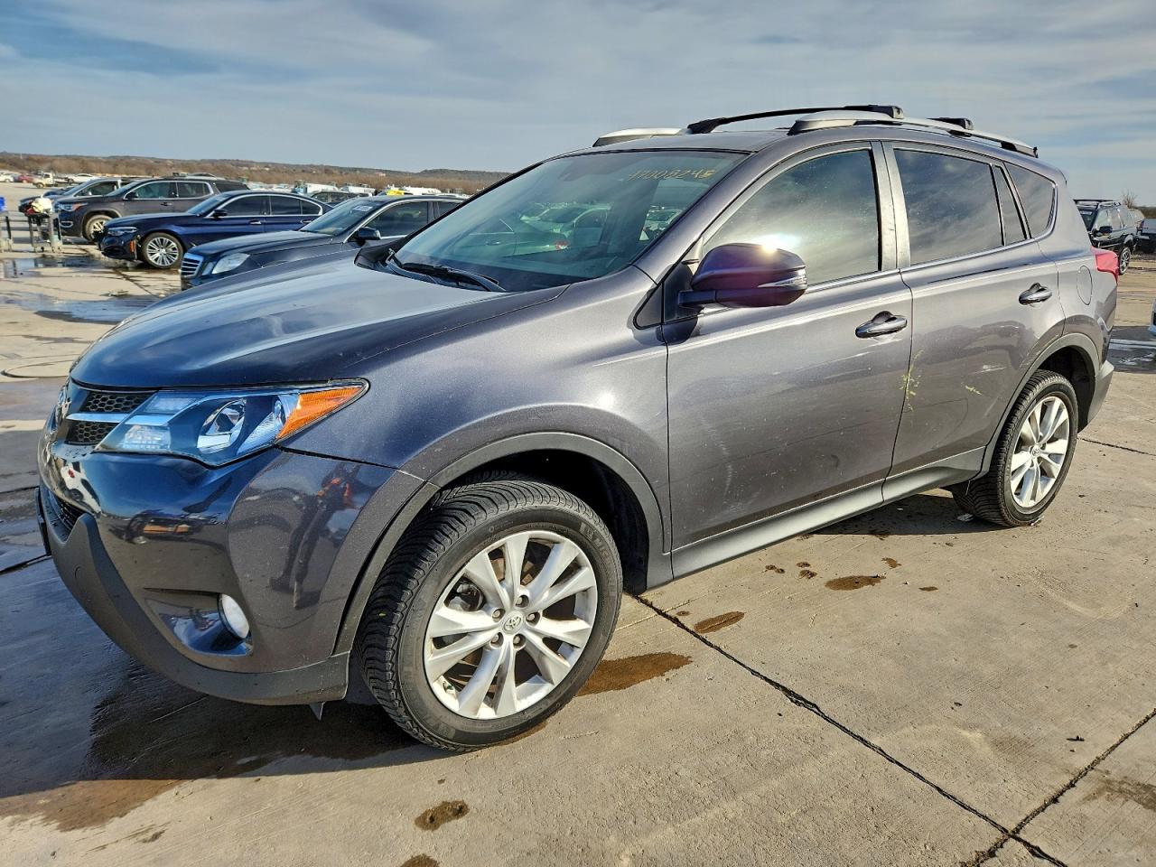 2015 Toyota RAV4 Limited, VIN 2T3YFREV2FW193119 — Side