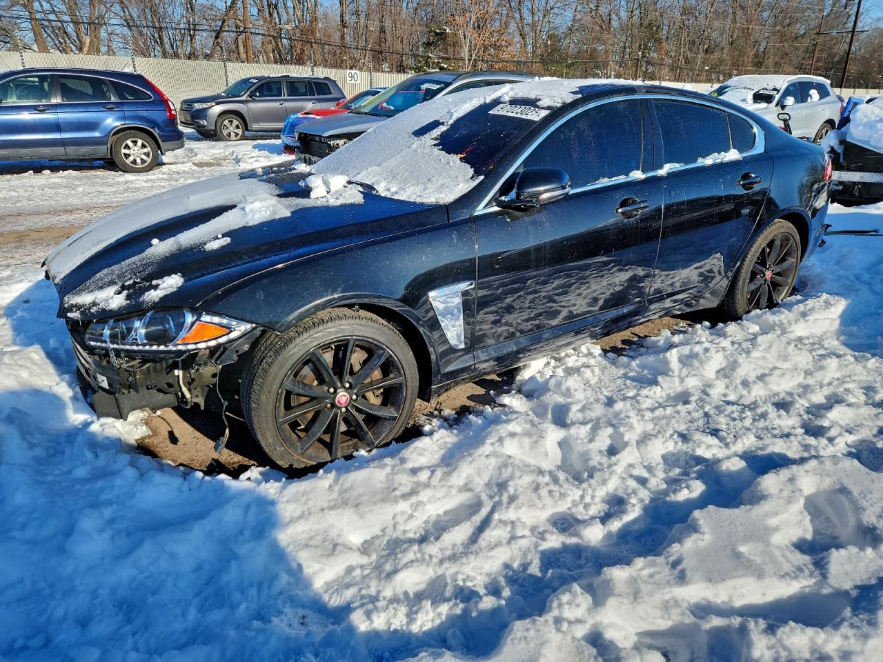 2015 Jaguar XF Portfolio, VIN SAJWJ0FF4F8U59384 — Vandalism
