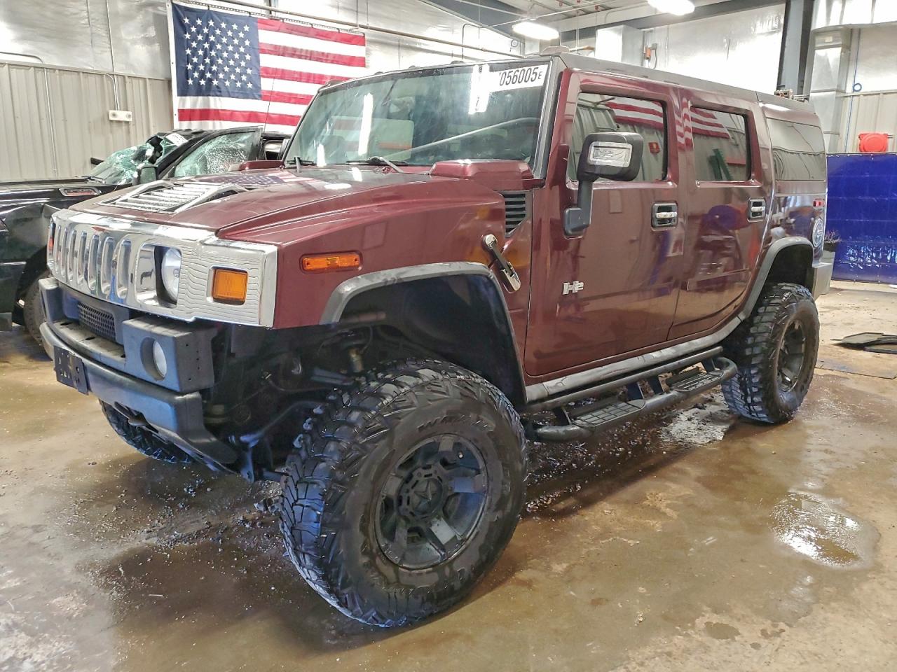 2007 Hummer H2 SUV, VIN 5GRGN23U87H105518 — Hail