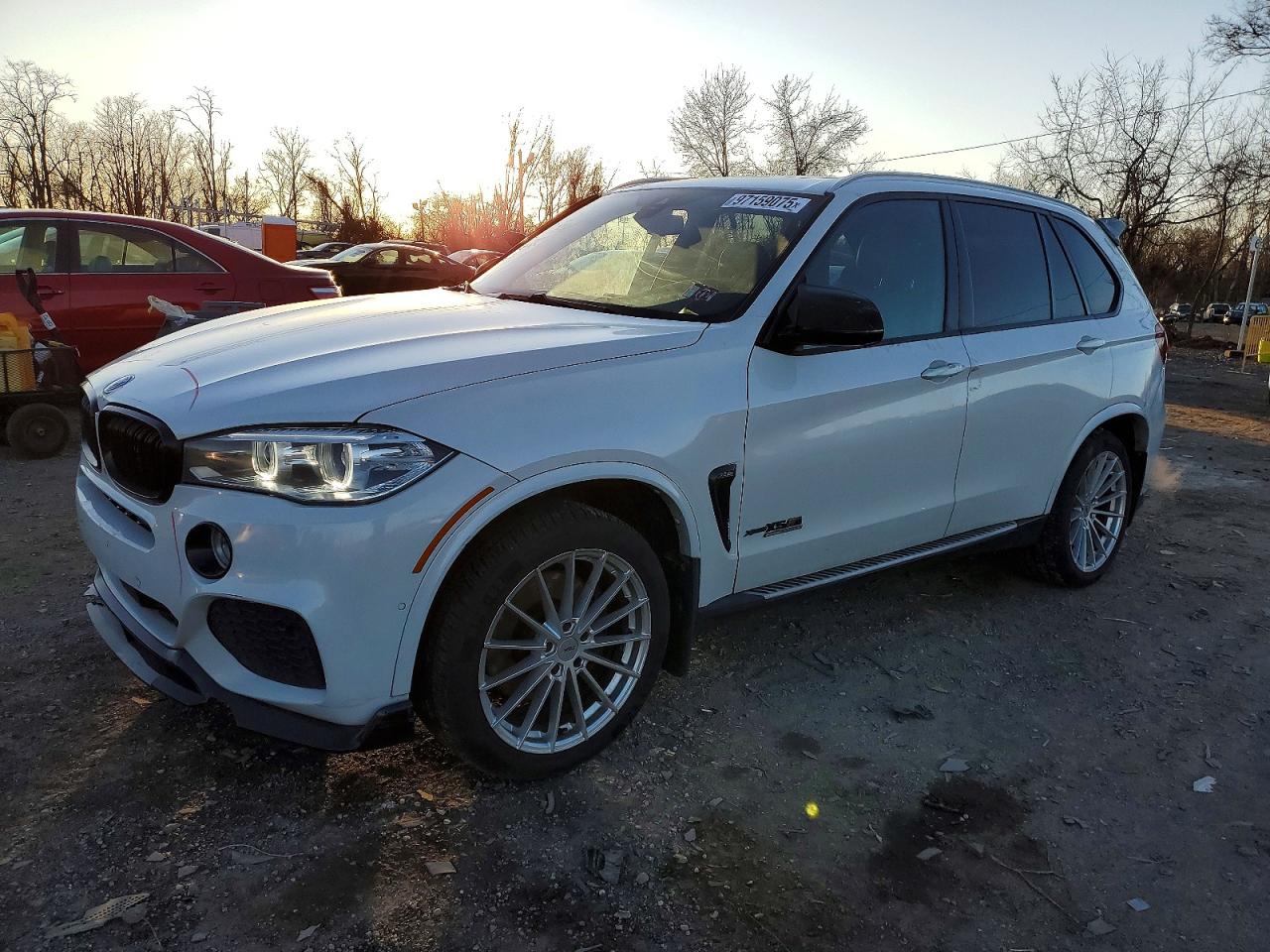 2018 BMW X5 xDrive50i, VIN 5UXKR6C57J0U14711 — Side