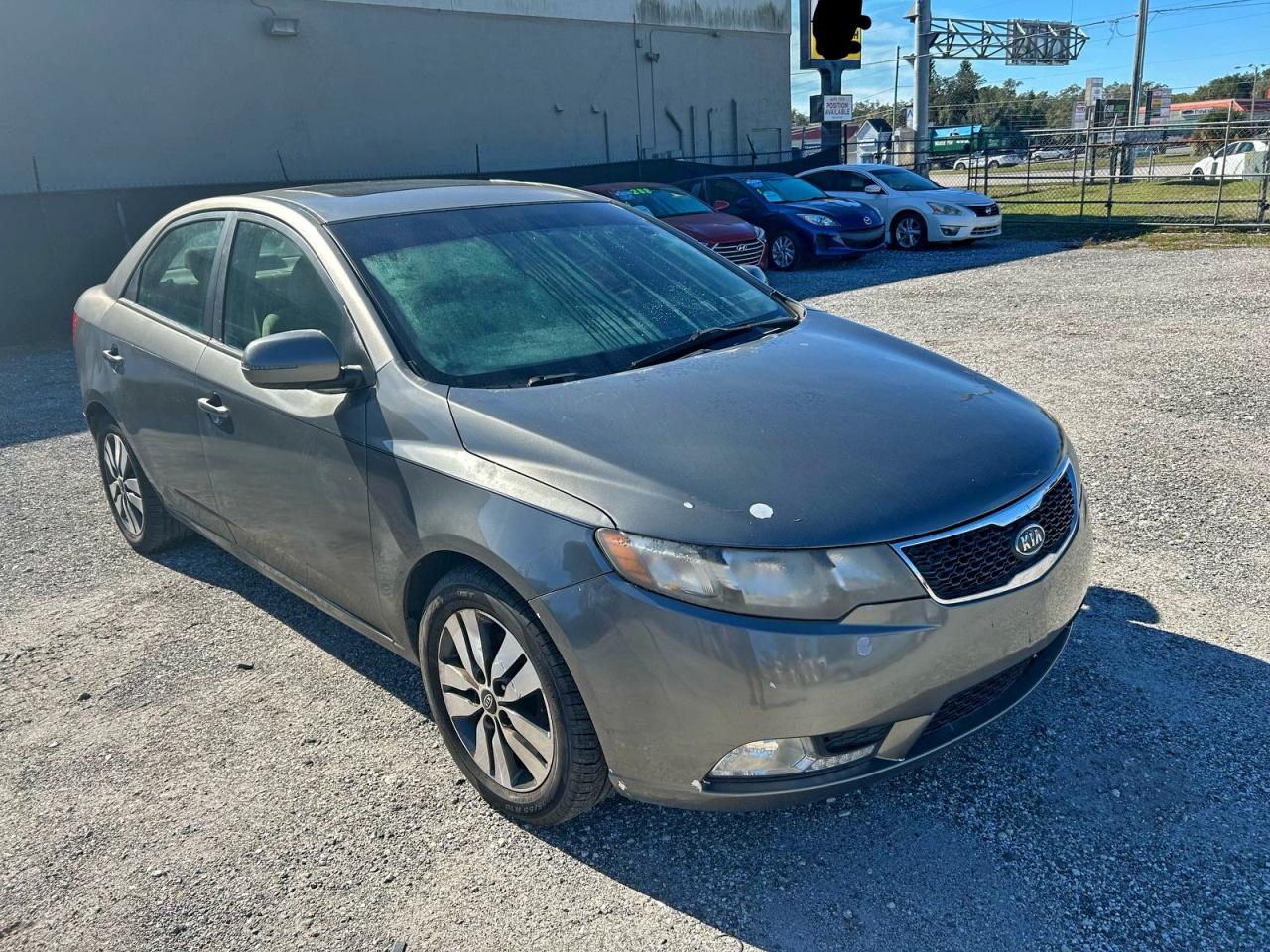 2013 Kia Forte EX, VIN KNAFU4A22D5655692 — Prior damage history