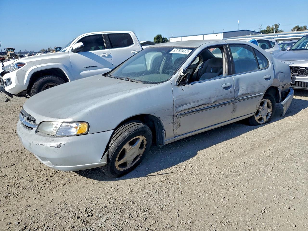 1999 Nissan Altima XE, VIN 1N4DL01DXXC251021 — Side