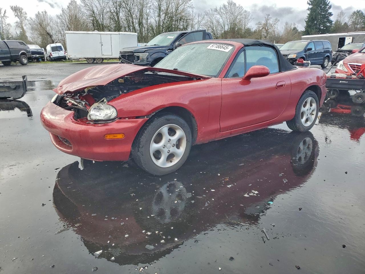 1999 Mazda MX-5 Miata, VIN JM1NB3532X0104438 — Front end