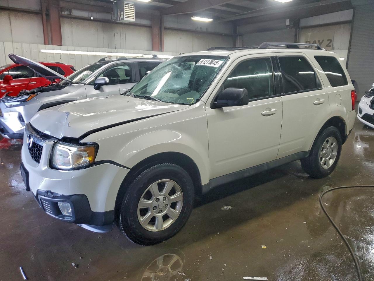2011 Mazda Tribute Grand Touring, VIN 4F2CY9GGXBKM01348 — Front end