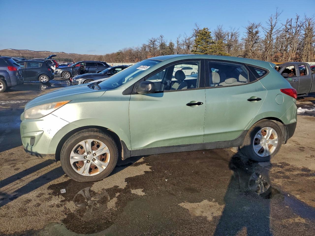 2010 Hyundai Tucson GLS, VIN KM8JT3AC5AU070900 — Minor dents and scratches