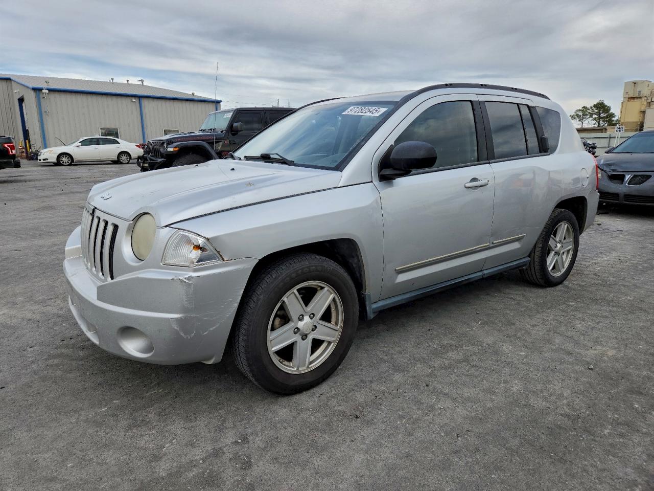 2010 Jeep Compass Sport, VIN 1J4NT4FB6AD554211 — Rear end