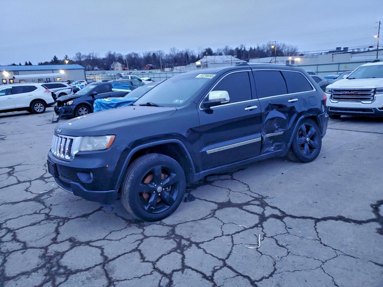 2013 Jeep Grand Cherokee Overland, VIN 1C4RJFCT8DC655623 — Undercarriage