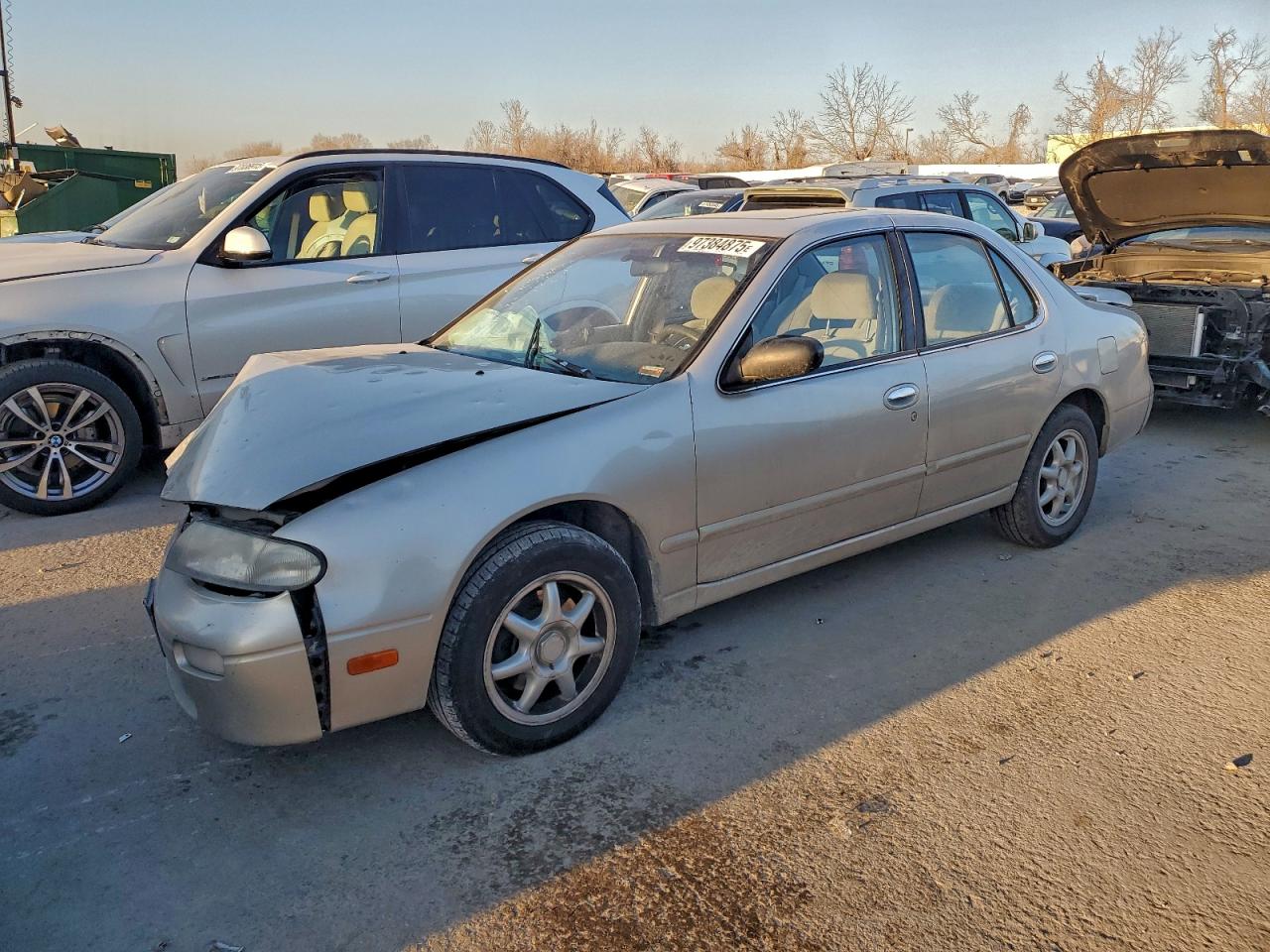 1997 Nissan Altima XE, VIN 1N4BU31D3VC129250 — Hail
