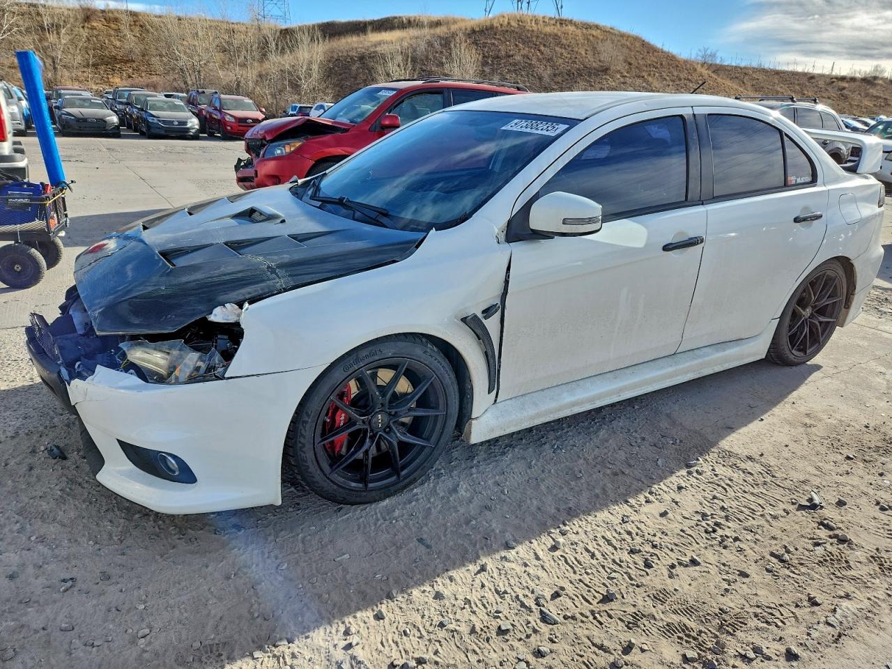 2015 Mitsubishi Lancer Evolution GSR, VIN JA32W8FV4FU026559 — Front end