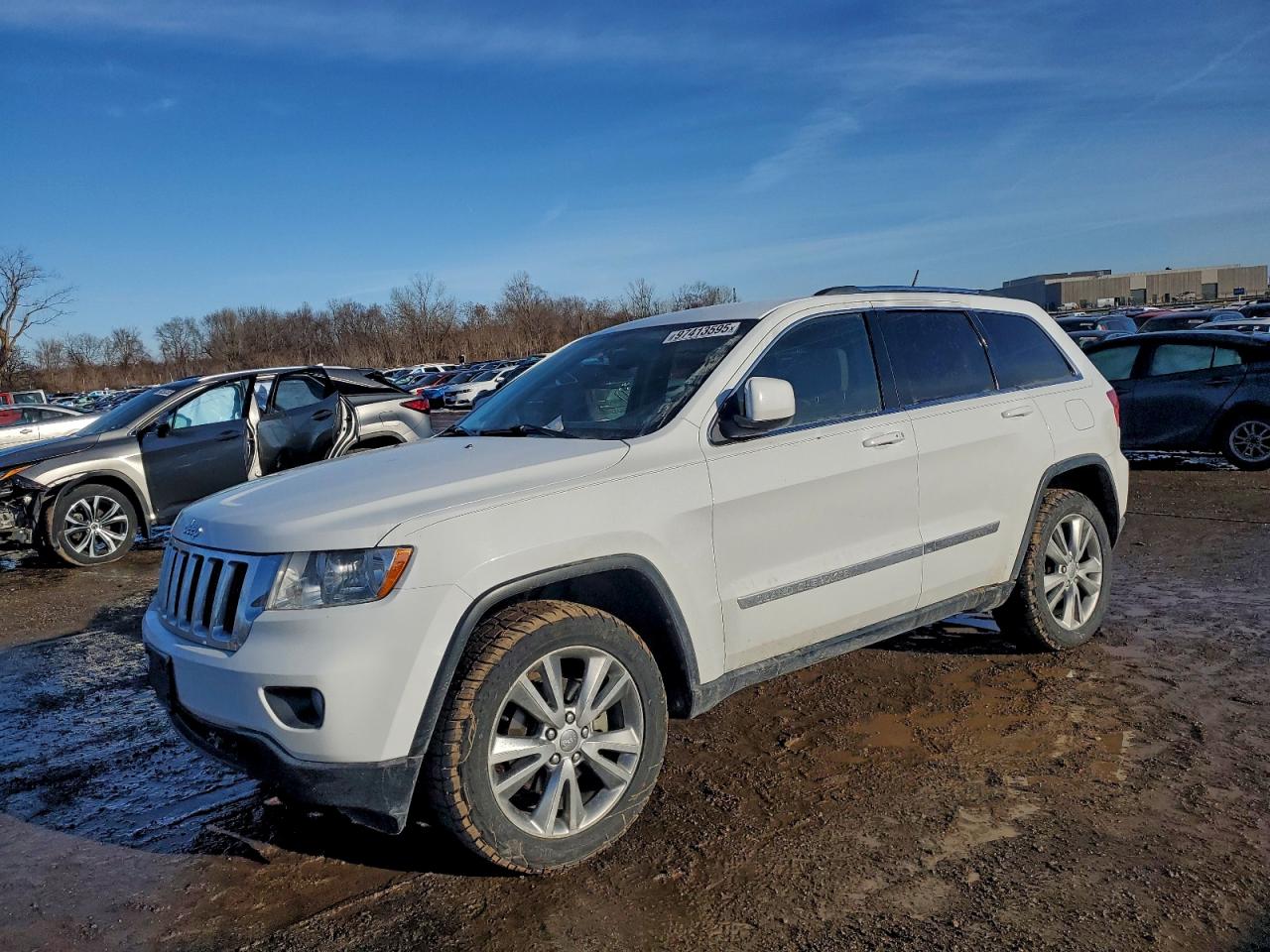 2013 Jeep Grand Cherokee Laredo, VIN 1C4RJFAGXDC644323 — Rear end