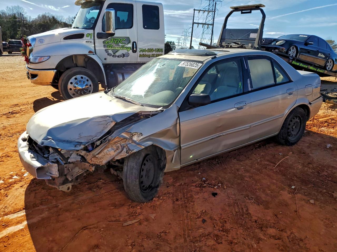 1999 Mazda Protege DX, VIN JM1BJ2223X0117467 — Перед