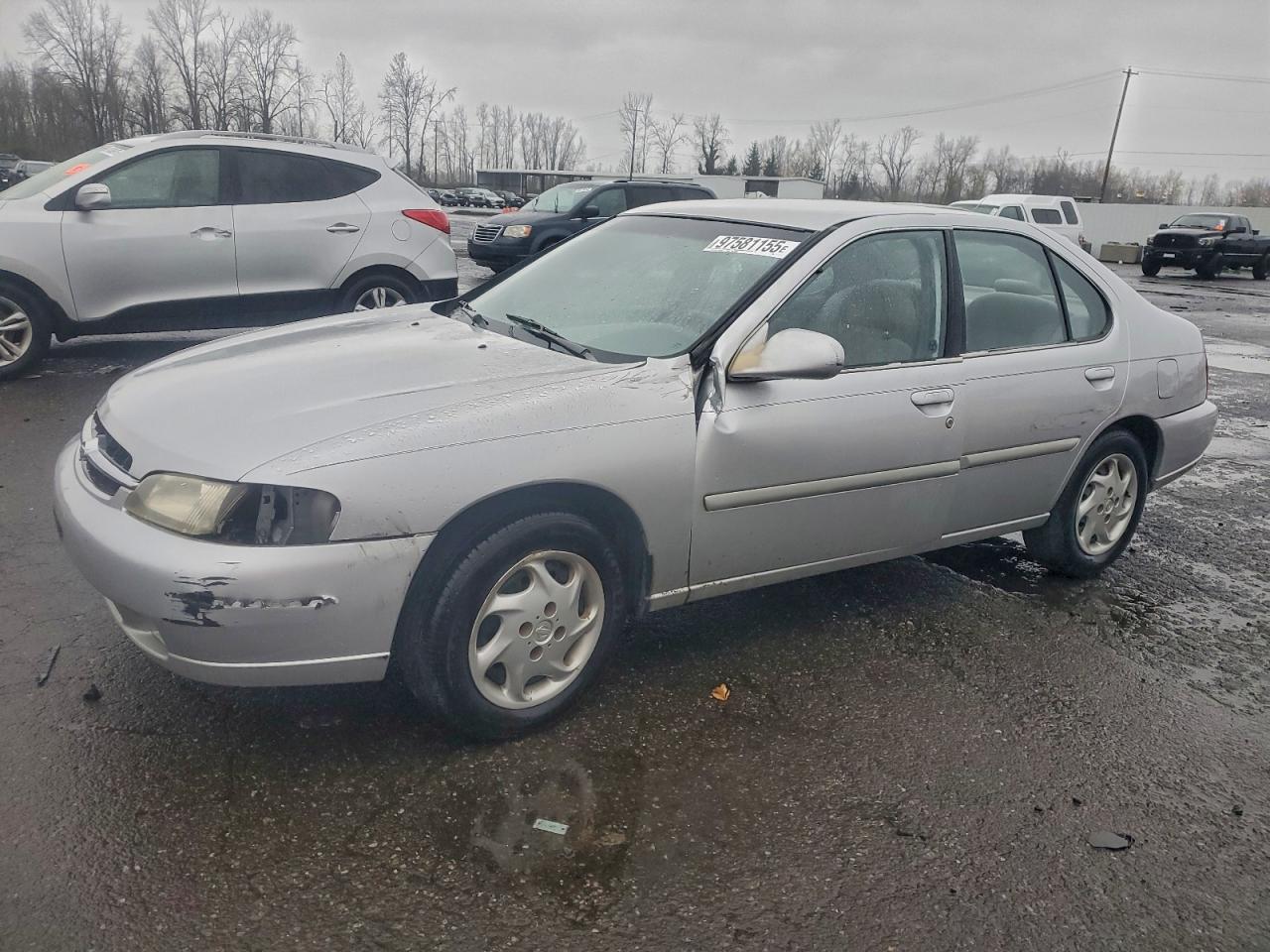 1999 Nissan Altima XE, VIN 1N4DL01D0XC164776 — Side