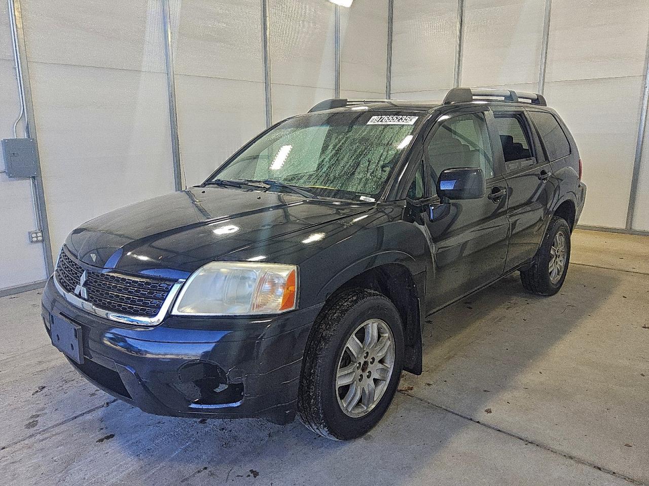 2011 Mitsubishi Endeavor LS, VIN 4A4JN2AS1BE035677 — Minor dents and scratches