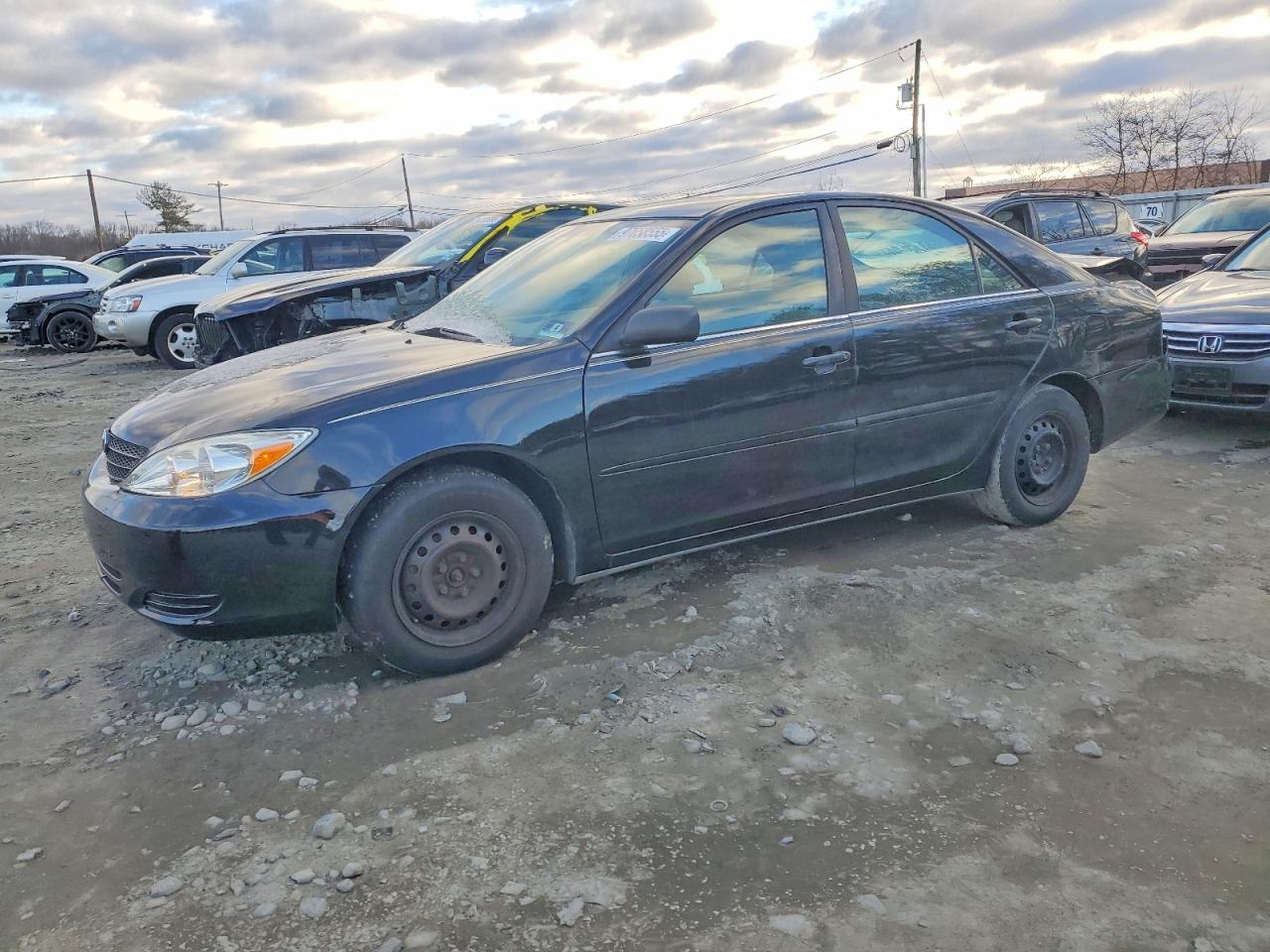 2002 Toyota Camry LE, VIN 4T1BE32K02U060409 — Rear end
