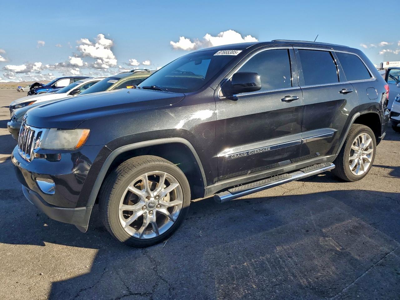 2013 Jeep Grand Cherokee Laredo, VIN 1C4RJEAG0DC569531 — Rear end