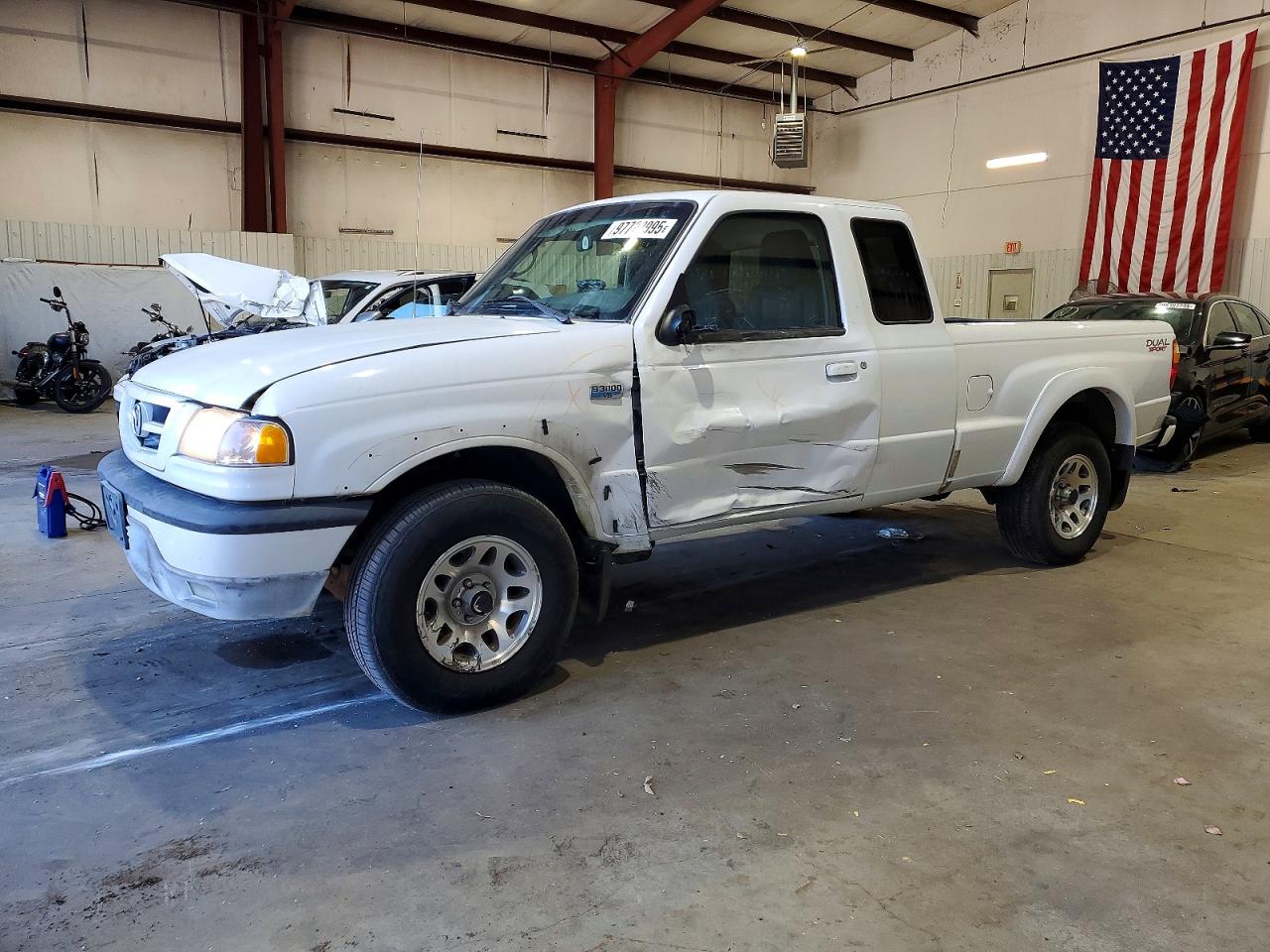 2004 Mazda B-Series DS, VIN 4F4YR16U74TM04546 — Side