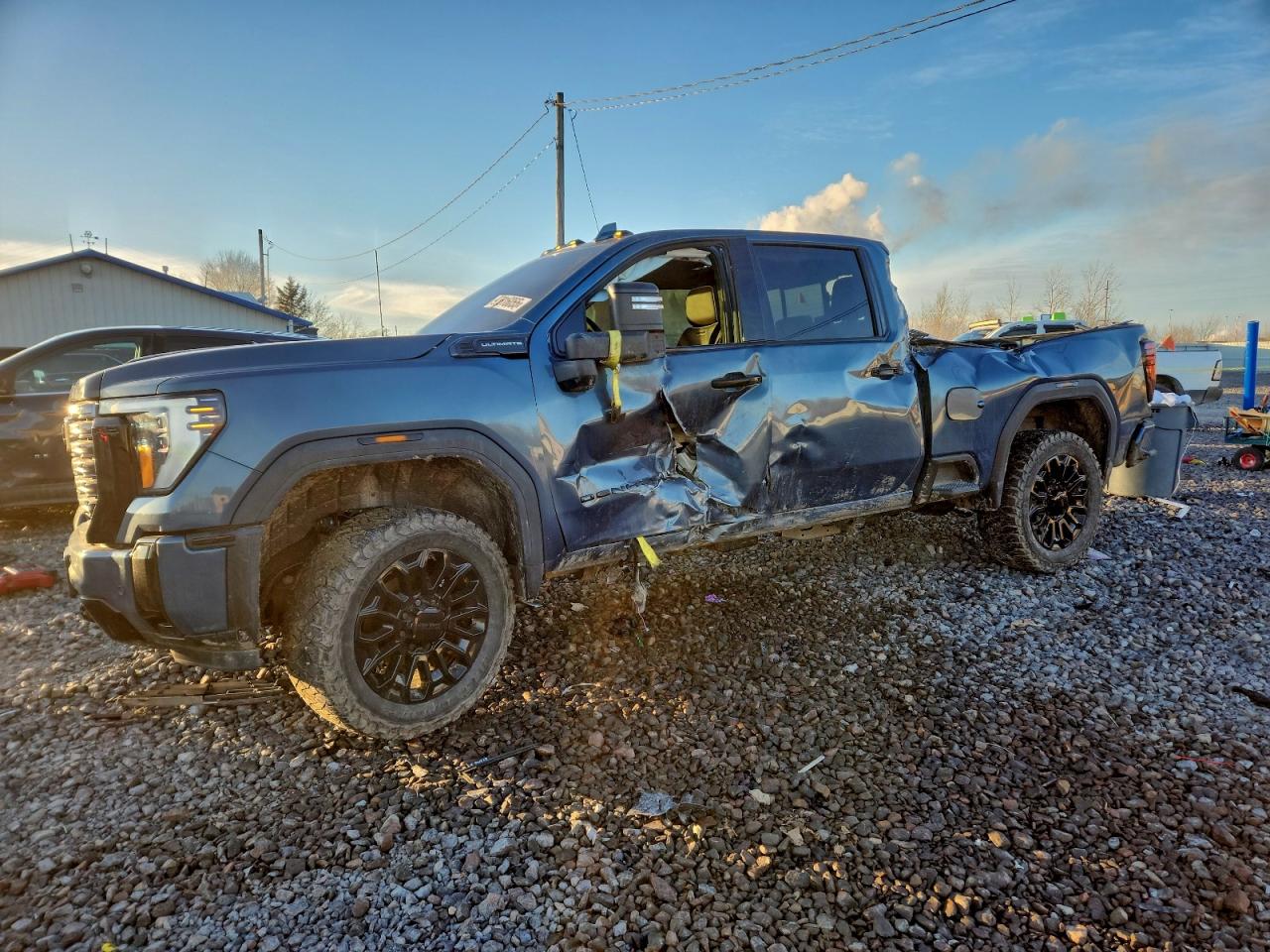 2025 GMC Sierra 2500HD Denali Ultimate, VIN 1GT4UXEY0SF294643 — Side