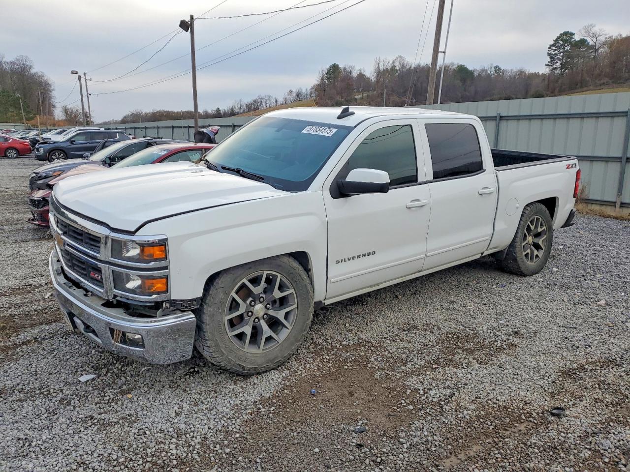 2015 Chevrolet Silverado 1500 LT, VIN 3GCUKREC0FG490642 — Side