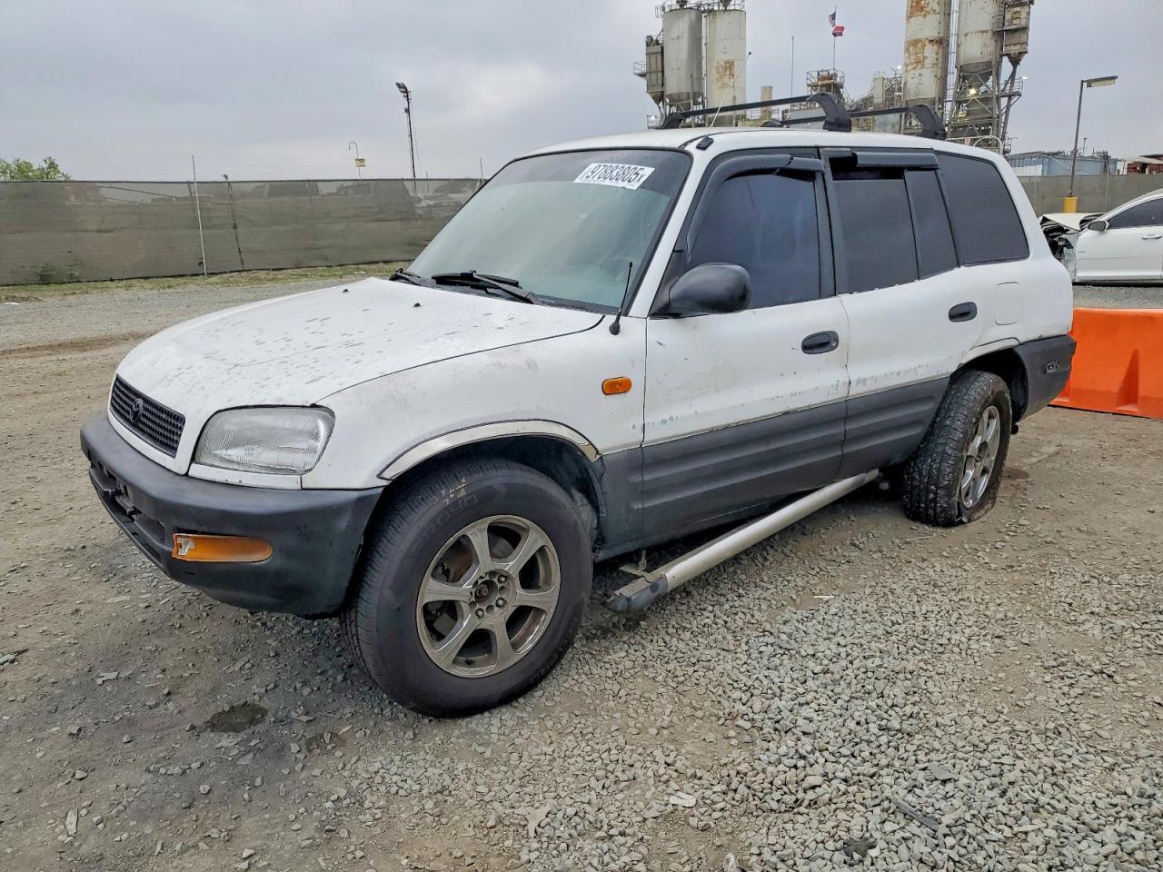 1997 Toyota RAV4, VIN JT3GP10VXV7008377 — Side