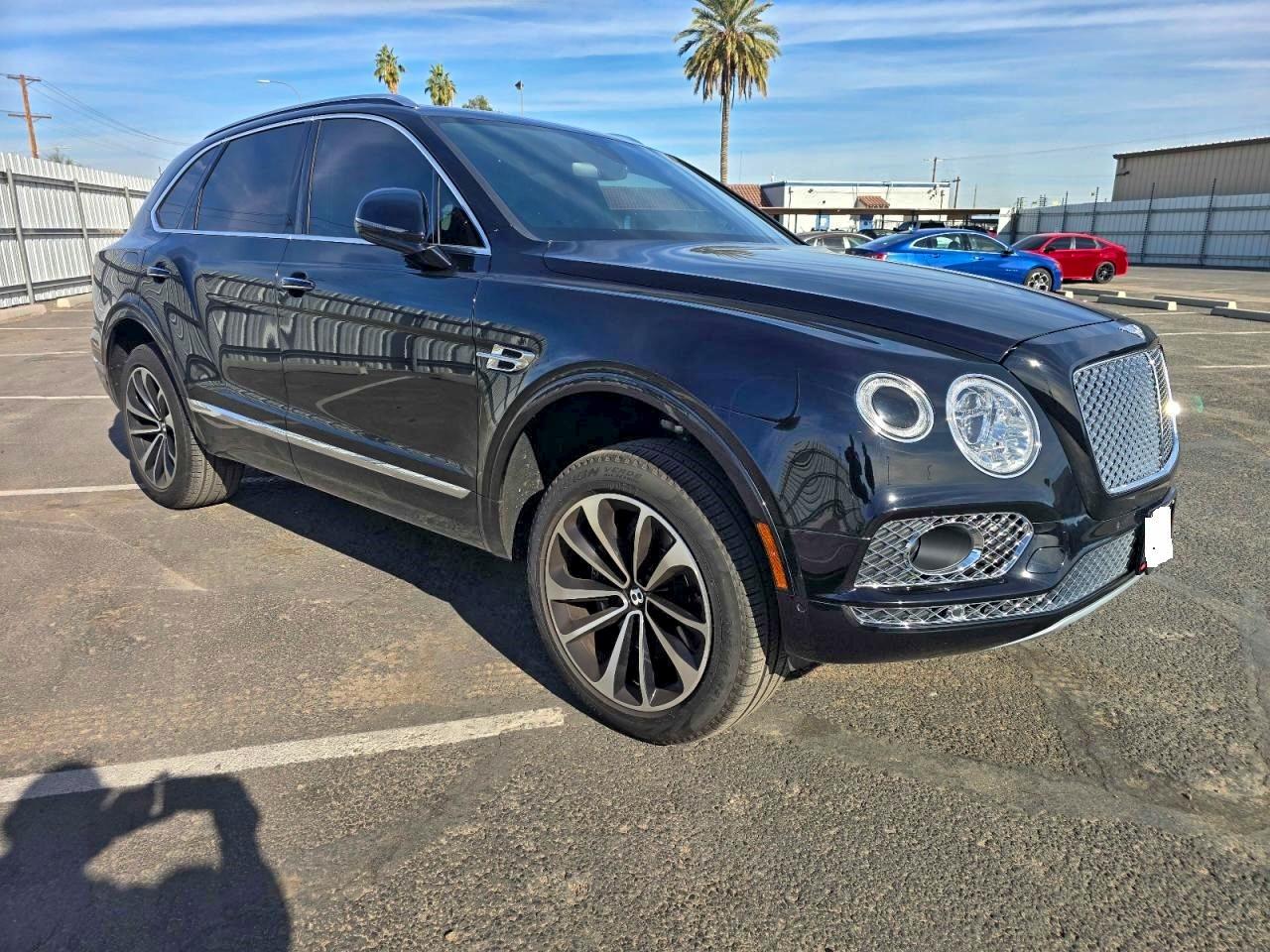 2017 Bentley Bentayga W12, VIN SJAAC2ZV6HC015703 — Prior damage history