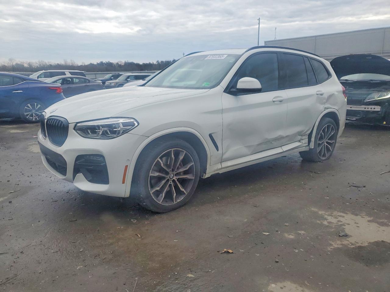 2021 BMW X3 M40i, VIN 5UXTY9C03M9H79516 — Side