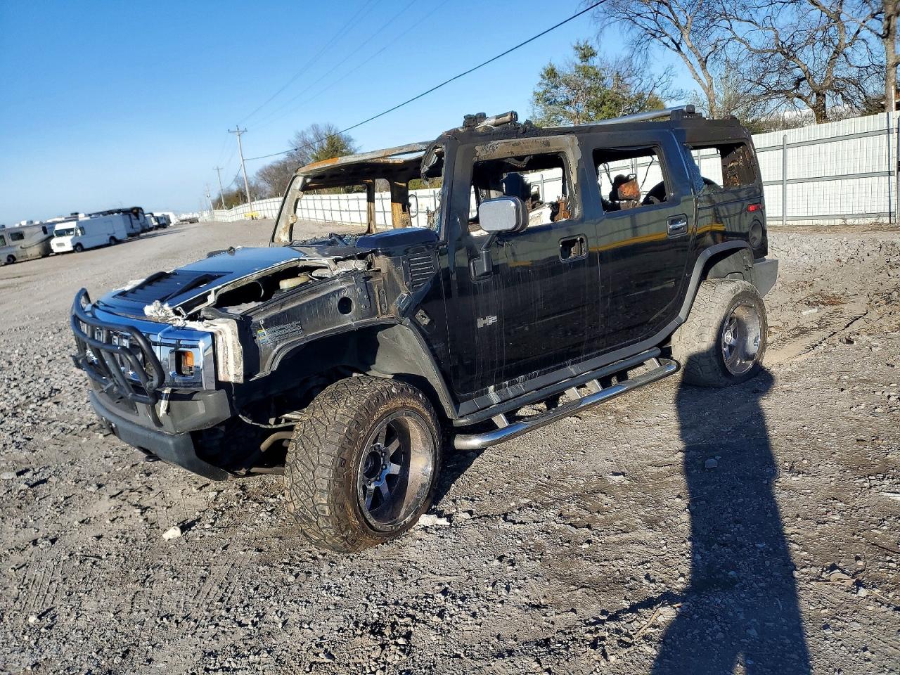2003 Hummer H2, VIN 5GRGN23U03H132318 — Burn