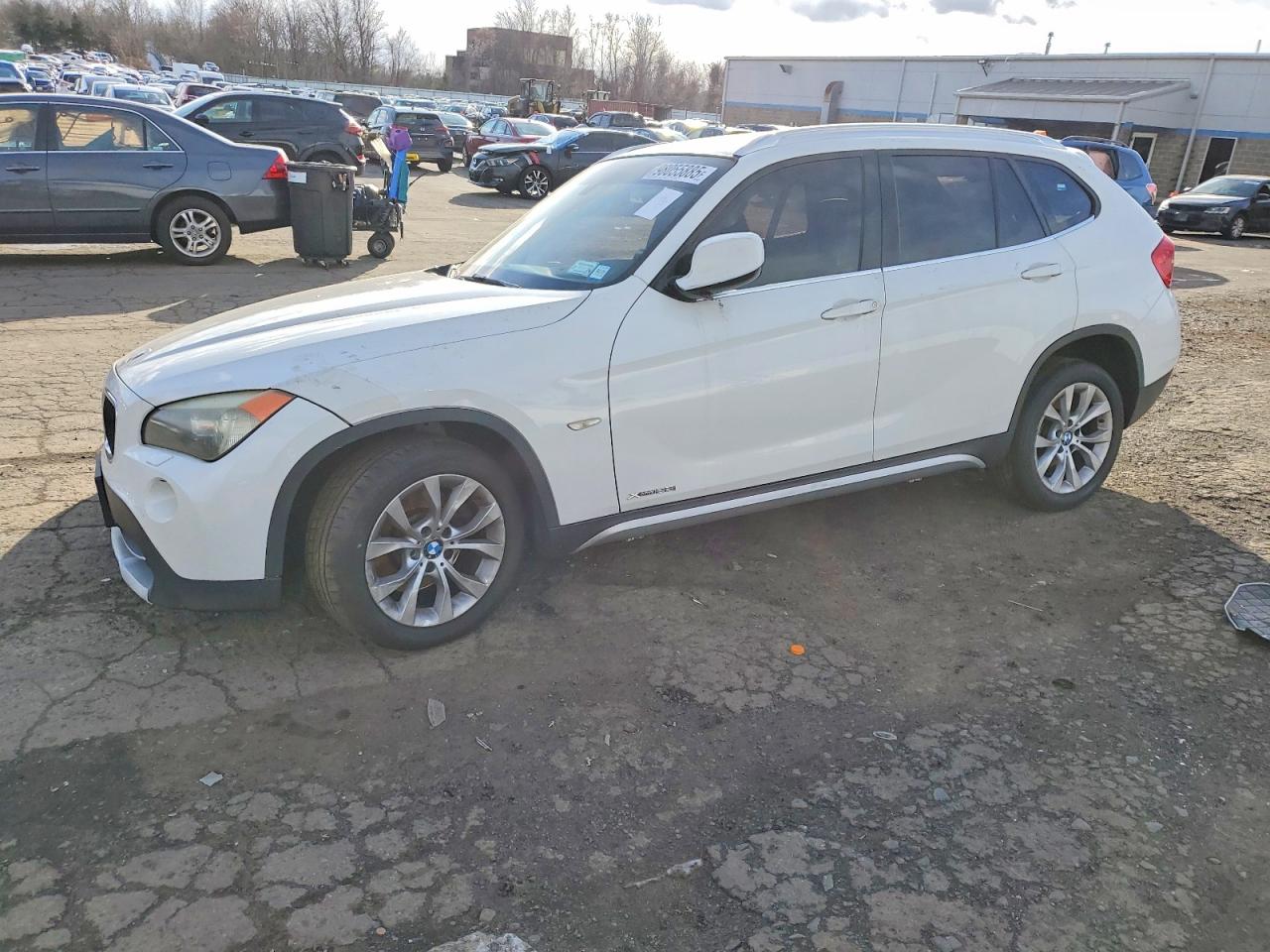 2012 BMW X1 28i, VIN WBAVL1C54CVR75468 — Side