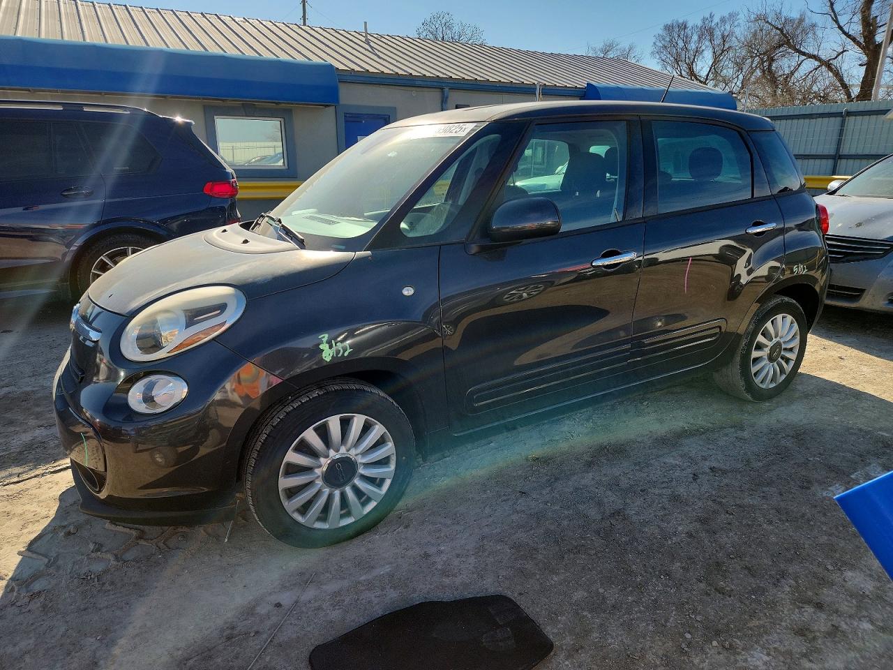 2015 FIAT 500L Easy, VIN ZFBCFABH5FZ032034 — Rear end