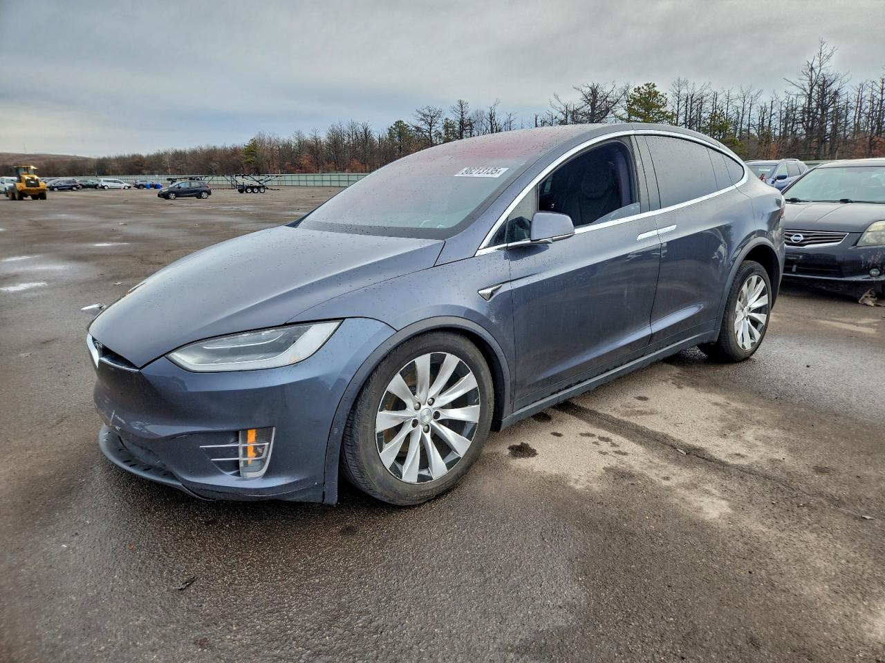 2019 Tesla Model X 75D, VIN 5YJXCAE24KF184661 — Front end