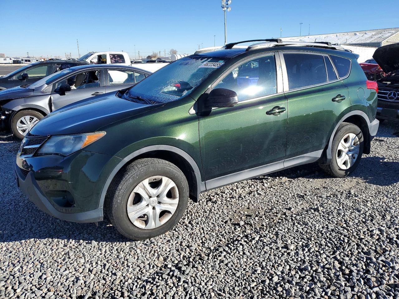 2013 Toyota RAV4 LE, VIN 2T3BFREV9DW107372 — Side