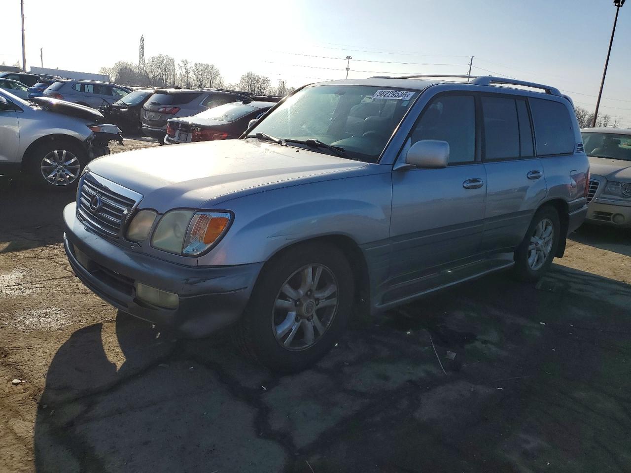 2004 Lexus LX 470, VIN JTJHT00W443536983 — Side