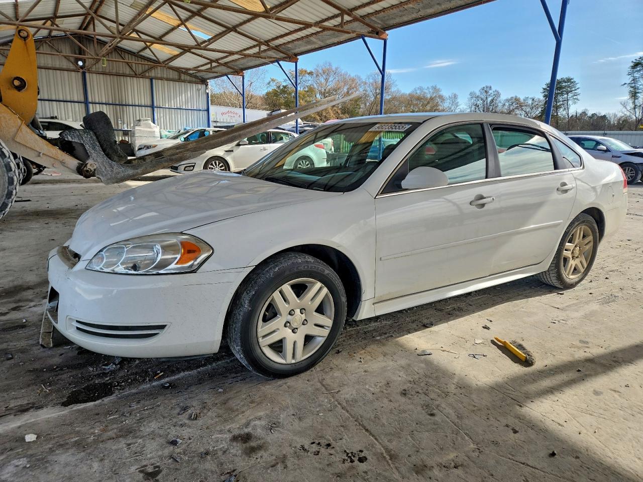 2015 Chevrolet Impala LT, VIN 2G1WB5E31F1138463 — Side