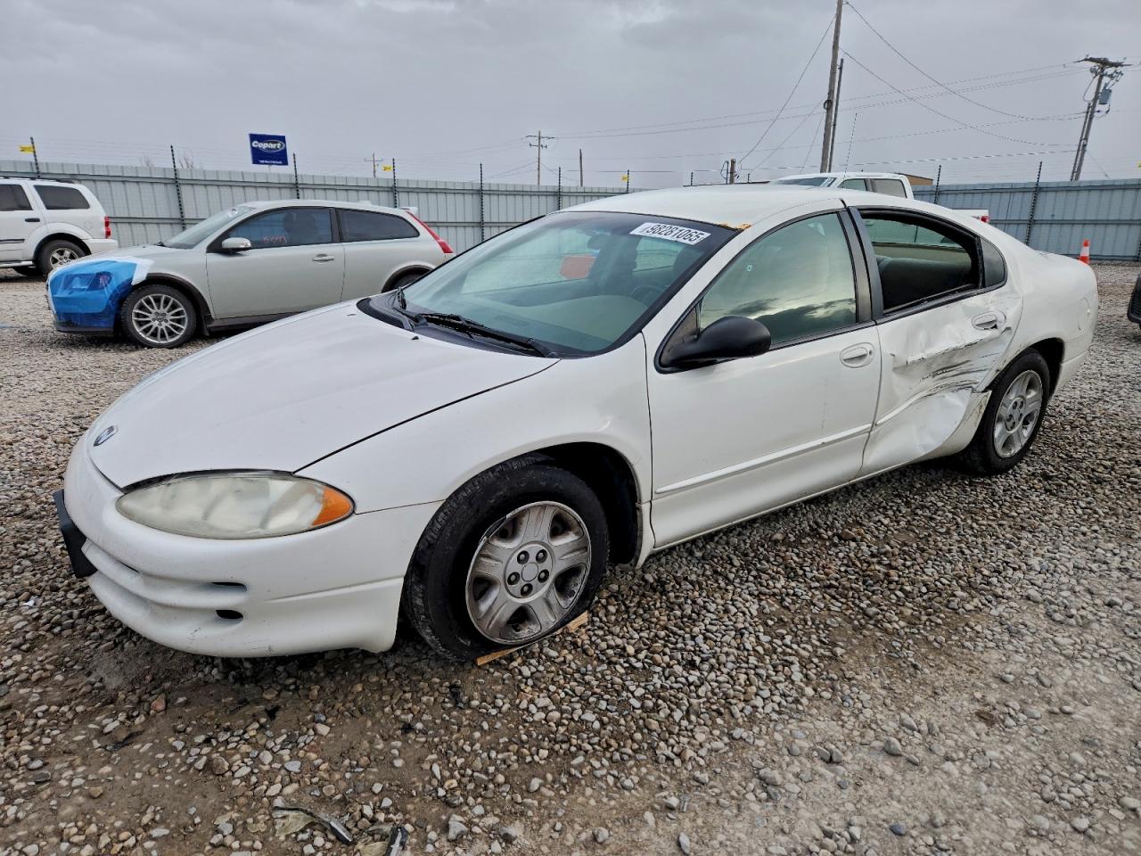 2003 Dodge Intrepid SE, VIN 2B3HD46R63H574656 — Бок