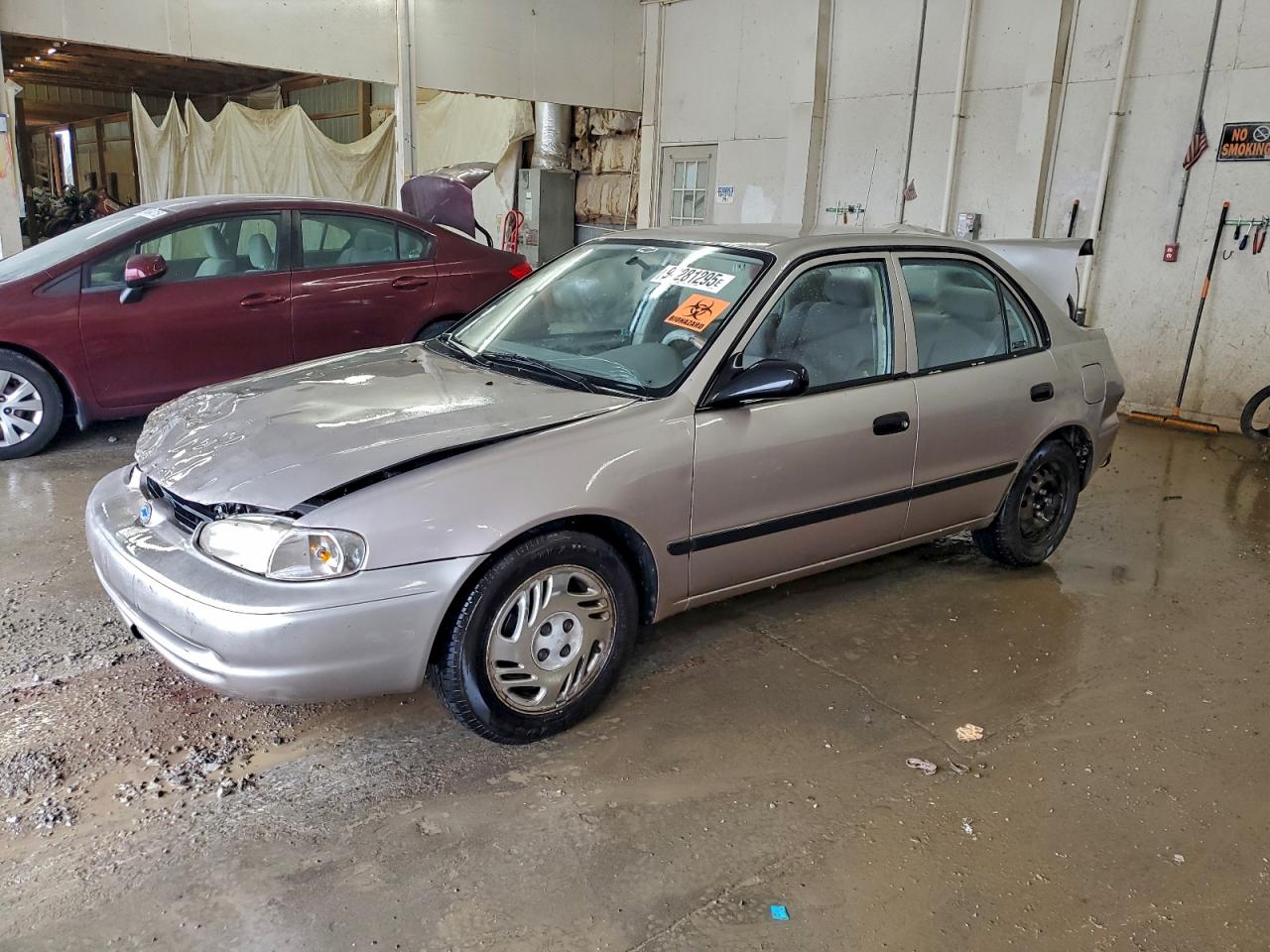 2001 Chevrolet Prizm, VIN 1Y1SK52891Z418388 — Vandalism