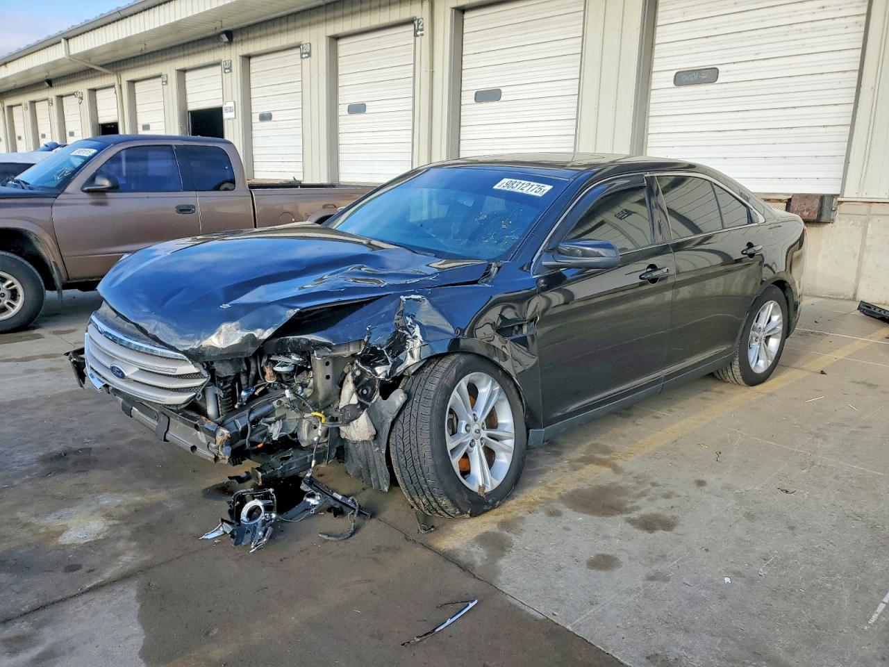 2015 Ford Taurus SEL, VIN 1FAHP2E81FG169510 — Front end