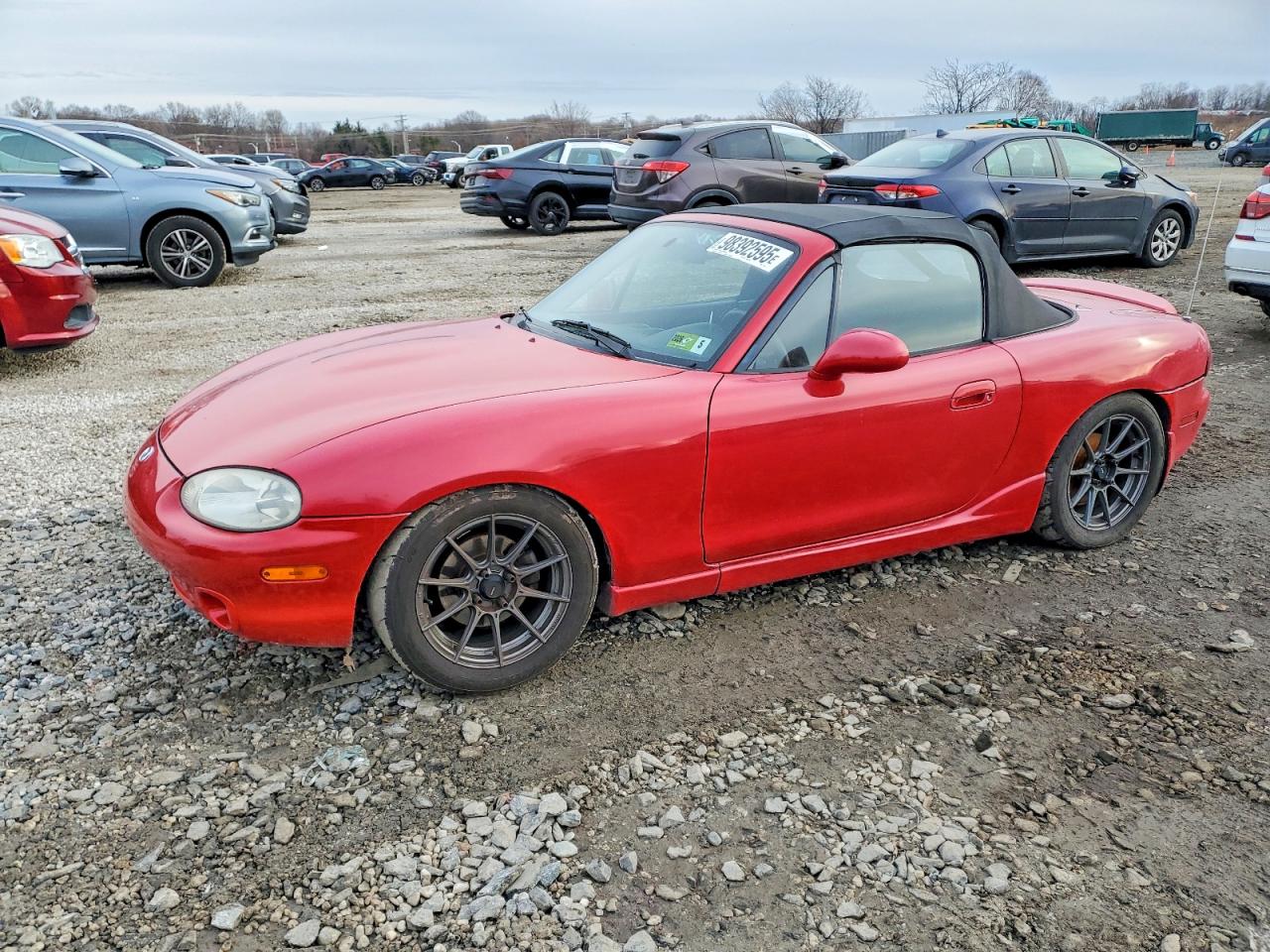 1999 Mazda MX-5 Miata, VIN JM1NB3532X0137133 — Minor dents and scratches