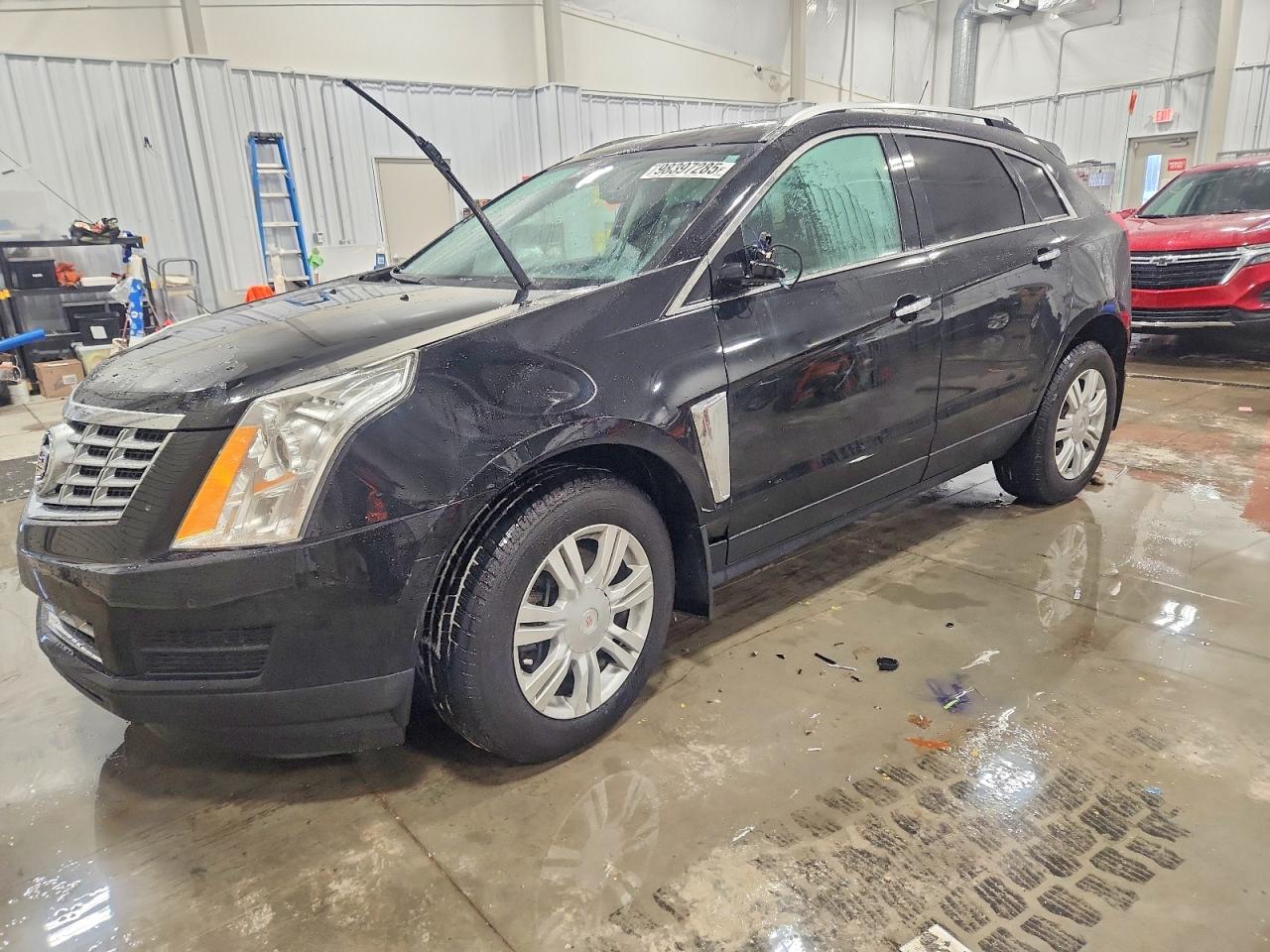 2016 Cadillac SRX Luxury Collection, VIN 3GYFNEE38GS511965 — Rear end