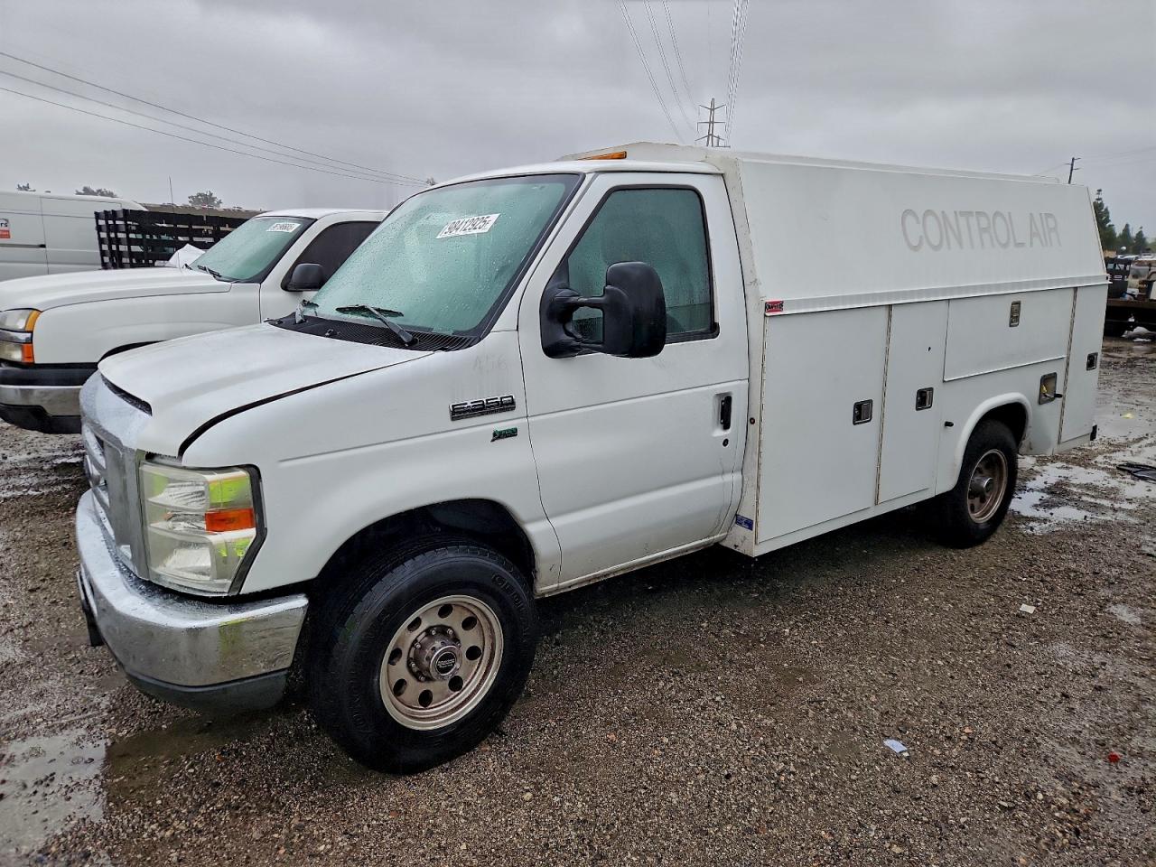 2014 Ford Econoline Commercial, VIN 1FDWE3FLXEDA29449 — Side