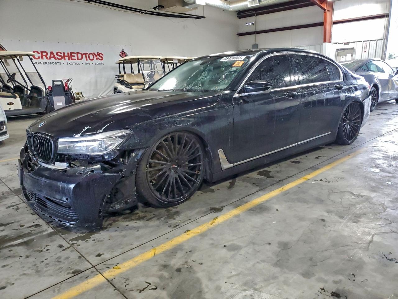 2016 BMW 7 Series 740i, VIN WBA7E2C5XGG548024 — Front end